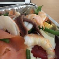 Smoked Salmon Salad · Smoked salmon, fresh tomato, bean sprouts, daikon, chives sauce, lemon juice, mesclun and ho...