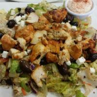 Greek Chicken Salad · Tomatoes, cucumber, onion, and olives.