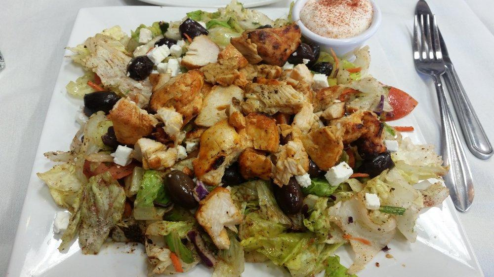 Greek Chicken Salad · Tomatoes, cucumber, onion, and olives.