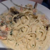 Seafood Alfredo · Shrimp sautéed with garlic, mushrooms and scallions