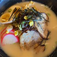 Tokyo Ramen Noodles · Pork broth, pork chashu, black fungus, corn, seaweed, egg, fish cake, green onion, bean spro...