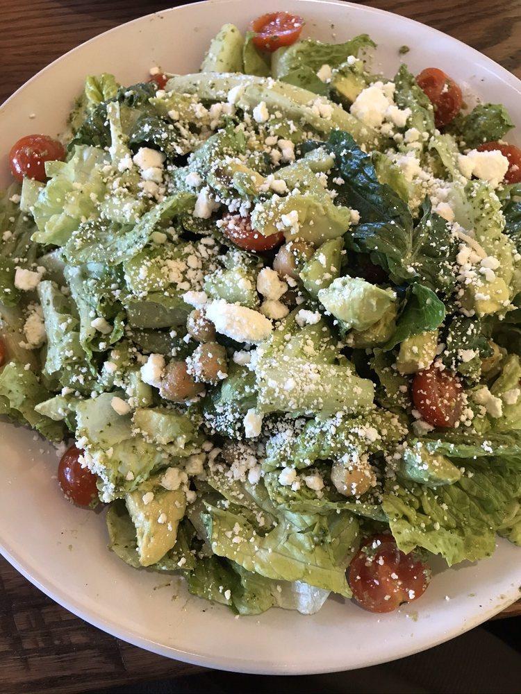 Marigold Salad · This gourmet salad contains sliced avocado, cucumber, cherry tomatoes, red onion, garbanzo beans, and feta cheese all on top of romaine lettuce, tossed with a cilantro pesto dressing. Add grilled chicken or bacon for an additional charge.