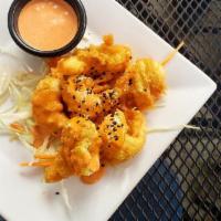 Bang Bang Shrimp · 5 pieces. Lightly breaded shrimp tossed in a sweet and spicy yum yum sauce.