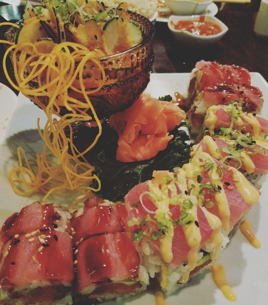 Tigress Roll · Spicy tuna, tempura crunch, and avocado inside, topped with Seared tuna, scallion and spicy mayo.