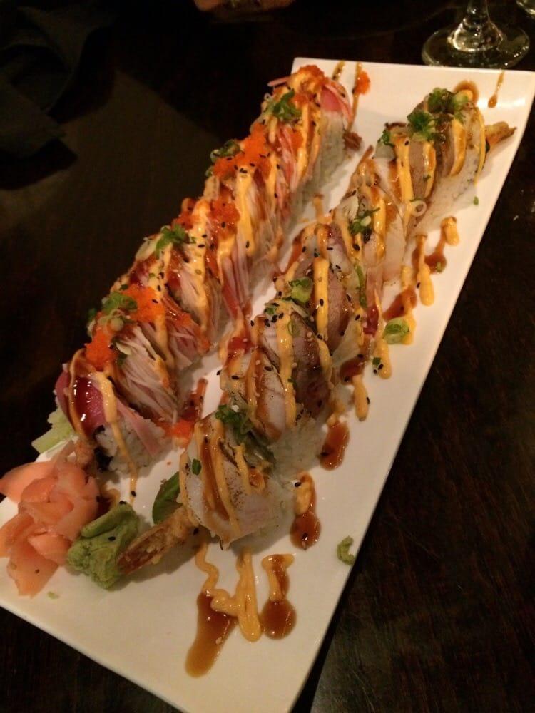 Daddy Roll · Crunchy, tempura shrimp, jalapeno, cucumber, avocado inside, topped with tuna, crab, eel sauce, spicy mayo, masago, and scallion.