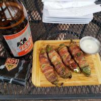 Toro Eggs · 4 grilled bacon wrapped jalapeno stuffed with cream cheese.