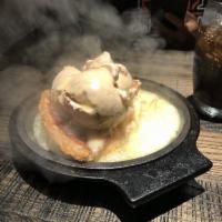 Mexican Apple Pie · Sizzled in Mexican brandy butter with cinnamon ice cream.