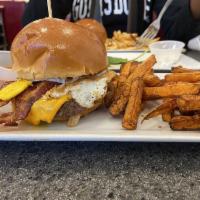 Southwest Burger · Cheddar cheese, crisp bacon, fried egg and chipotle sauce. Certified USDA Angus beef hand pr...