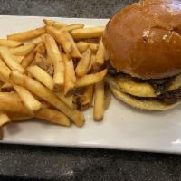 Cowboy Burger · Spicy blackened burger, grilled mushrooms, onions, bacon and Jack cheese. Certified USDA Ang...