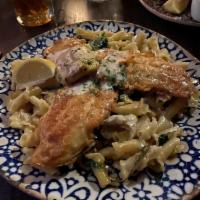 Large Filet of Sole Florentine · Egg dipped sole served over campanelle pasta with sauteed spinach and artichokes in a lemon ...