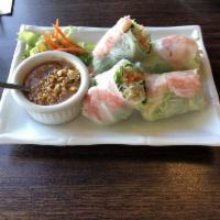 Thai Salad · Fresh lettuce, cucumbers, tomatoes, and onions, served with Thai-style (peanut sauce based) ...