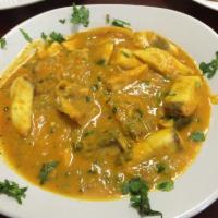 Fish Curry · Fish cooked in a blend of onion and tomato based sauce. Served with rice or naan.