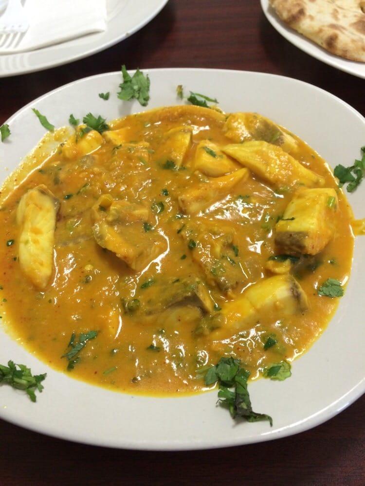 Fish Curry · Fish cooked in a blend of onion and tomato based sauce. Served with rice or naan.