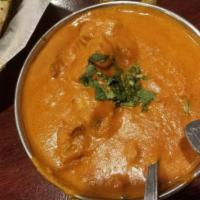 Chicken Tikka Masala · Tender pieces of chicken, bell pepper, onion cooked in a hot and spicy tomato based sauce fl...