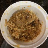 Chicken Dum Biryani · Basmati rice layered and slow cooked with cuts of chicken meat, marinated in yogurt, fried o...