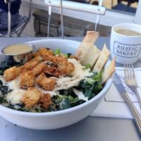 Rustic Caesar Salad · Mix of chopped romaine and lacinato kale, grated Parmesan cheese, toasted pine nuts, capers,...