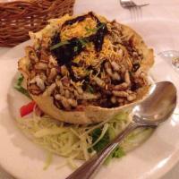 Sev Murmura Chaat · Vegetarian. Puffed rice, cilantro, vermicelli, dates, and tamarind.