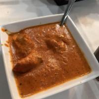 Chicken Tikka Masala · Cubes of white meat chicken marinated and roasted in our clay oven then simmered in tomato a...
