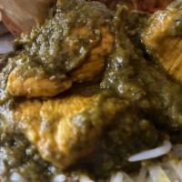 Chicken Saag · Boneless chicken cooked with spinach and flavored with freshly ground ginger, garlic and spi...