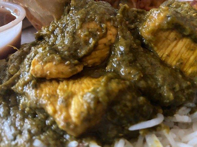 Chicken Saag · Boneless chicken cooked with spinach and flavored with freshly ground ginger, garlic and spices.
