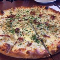 New Haven White Clam Pizza · Clams, garlic, seasonings, olive oil, bacon. No tomato sauce.