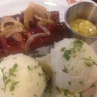 Polish Sausage · Grilled original Polish sausage with sauteed onions, served with mashed potatoes or bread an...