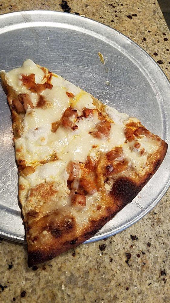 Chicken and Applewood Smoked Bacon Ranch Pizza · Grilled chicken, Applewood smoked bacon and ranch drizzle.