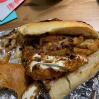 The Fat Jovi · Cheese steak, chicken fingers, mozzarella sticks, french fries, bacon and gravy. Served on 1...