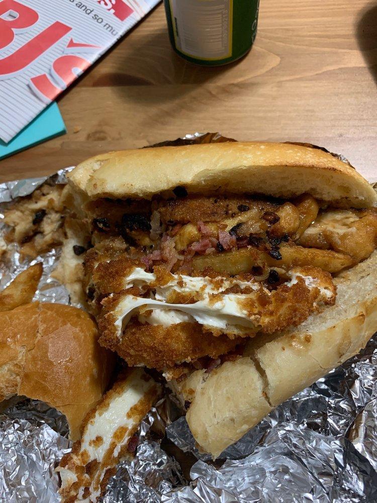 The Fat Jovi · Cheese steak, chicken fingers, mozzarella sticks, french fries, bacon and gravy. Served on 10