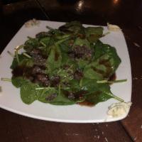 Spinach Salad · Tossed in house-made raspberry vinaigrette with pecans and Gorgonzola. 