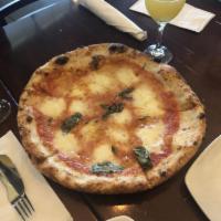 Margherita Di Bufala Pizza · Imported Bufala mozzarella, San Marzano tomato sauce and basil. We recommend adding only 1 a...