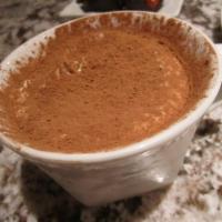 Tiramisu · Lady fingers dipped in espresso and rum, layered with sweet mascarpone cream. 