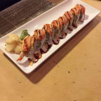 Rock and Roll · Shrimp tempura and cream cheese topped with smoked salmon, spicy mayo and teriyaki sauce. 5 ...