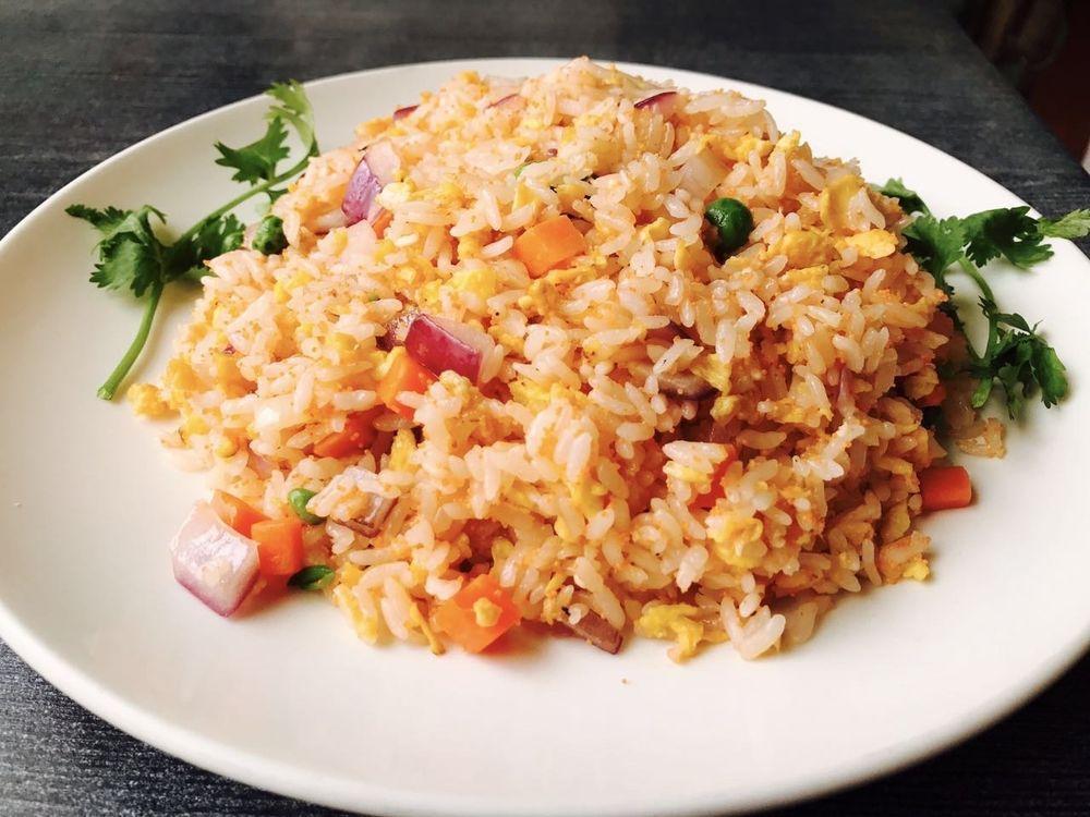 Young Chow Fried Rice · Stir fried.