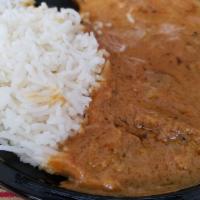 Korma · Rich sauce of spices and herbs enhance this traditional dish. Served with basmati rice.