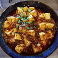Mapo Tofu · Served spicy.