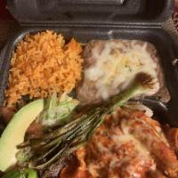 Tampiquena · Butter fried steak served under 2 cheese enchiladas with your choice of green, red or mole s...