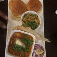 Pav Bhaji · Assorted vegetables cooked with masalas and served with pav, and handi pulao.