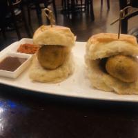 Vada Pav · Bread stuffed with spicy potato filling deep fried in a gram flour batter.