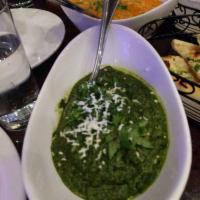 Palak Paneer · Spinach and garlic with cottage cheese.