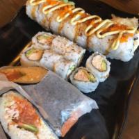 Chubby Roll · Top: massago (smelt fish eggs) with eel sauce, and our house jalapeno garlic sauce inside: s...