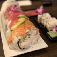 Original Monster Challenge Sushi Roll · Inside: shredded crab, salmon, avocado, cream cheese, and crunchy shrimp chips top: massage,...