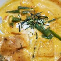 Panang Curry · Panang curry paste in coconut milk, string bean, bell pepper and kaffir leaf.