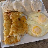 Country Breakfast · 2 eggs any style, served with hash browns and country gravy ladied over flakey biscuits. Sub...
