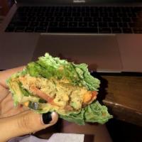 Garlic & Herb Falafel Wrap · VEGAN. Baked falafel, cucumber, bell pepper, fresh lettuce, tomato, and homemade hummus in a...