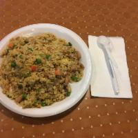 Chicken Fried Rice · Steamed white rice stir-fried w/ chicken, eggs, peas & carrots, and green onions. 