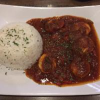 Shrimp Creole · Shrimp sauteed with onion, bell pepper, tomato, garlic and herb sauce served over rice.