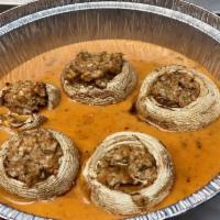Stuffed Mushrooms · Stuffed with crab meat mixture and sauteed in alla panna sauce.