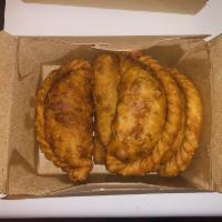 Jerk Chicken Empanada · 