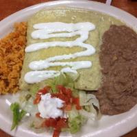 Enchiladas Suizas · 3 enchiladas stuffed with beef, chicken, or cheese. Topped with a uniquely delicious creamy-...
